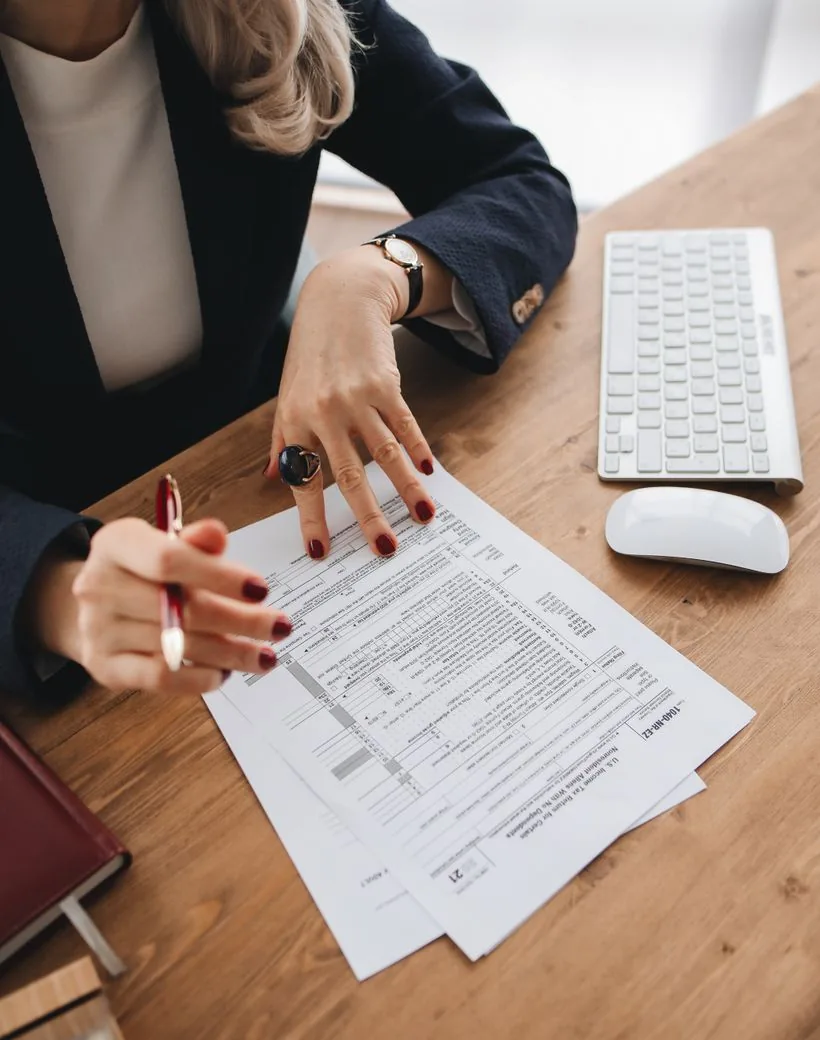 A Keystone accountant reviewing a client's tax return at her desk