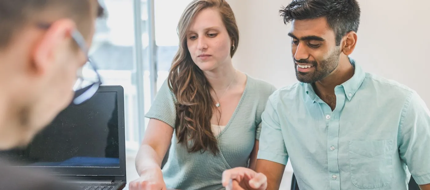 Clearpath Planning — a young couple reviewing their financial plan with a planner