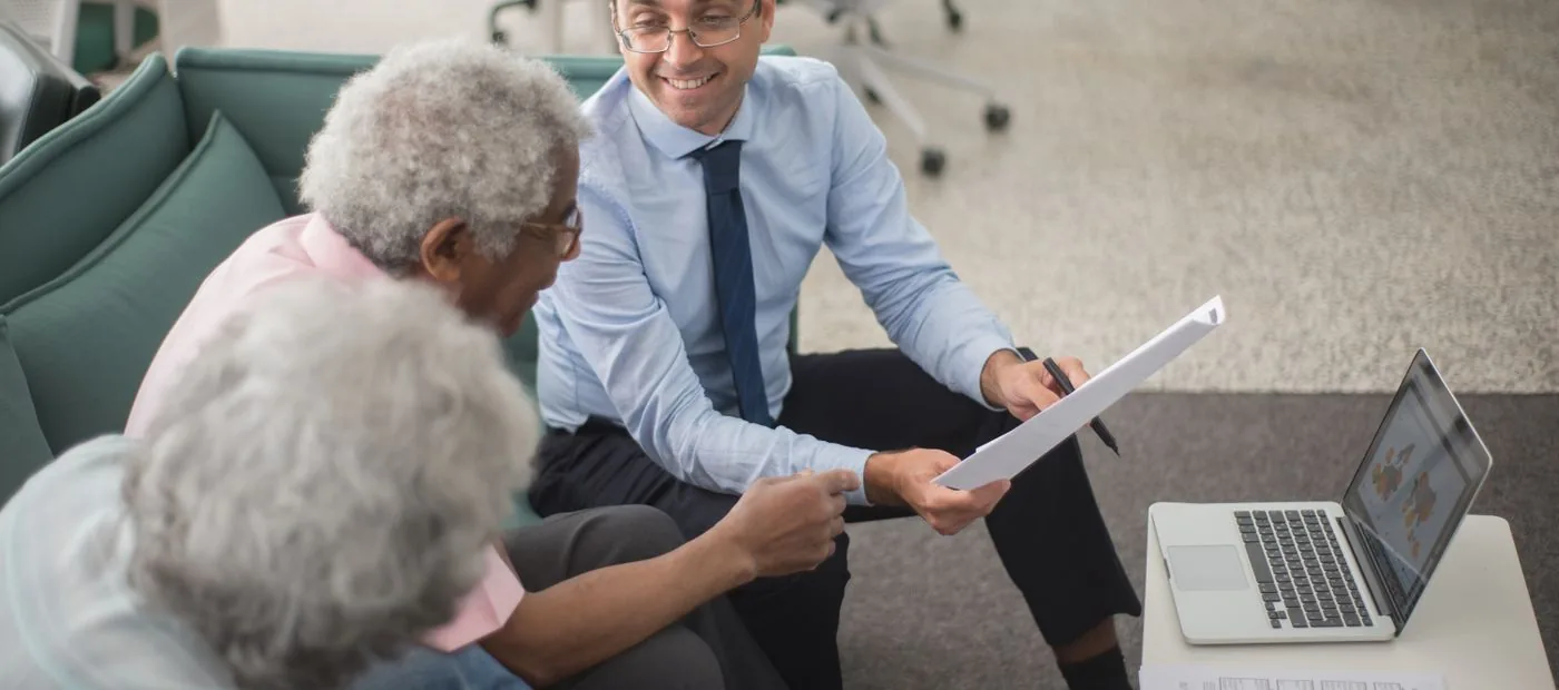 North Harbor Financial — an advisor reviewing a retirement plan with a couple