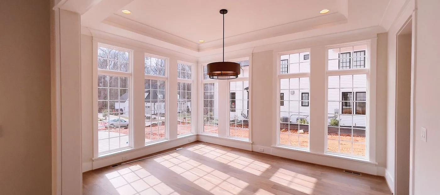 Hearthstone Remodeling — bright, finished home interior with warm wood floors and natural light