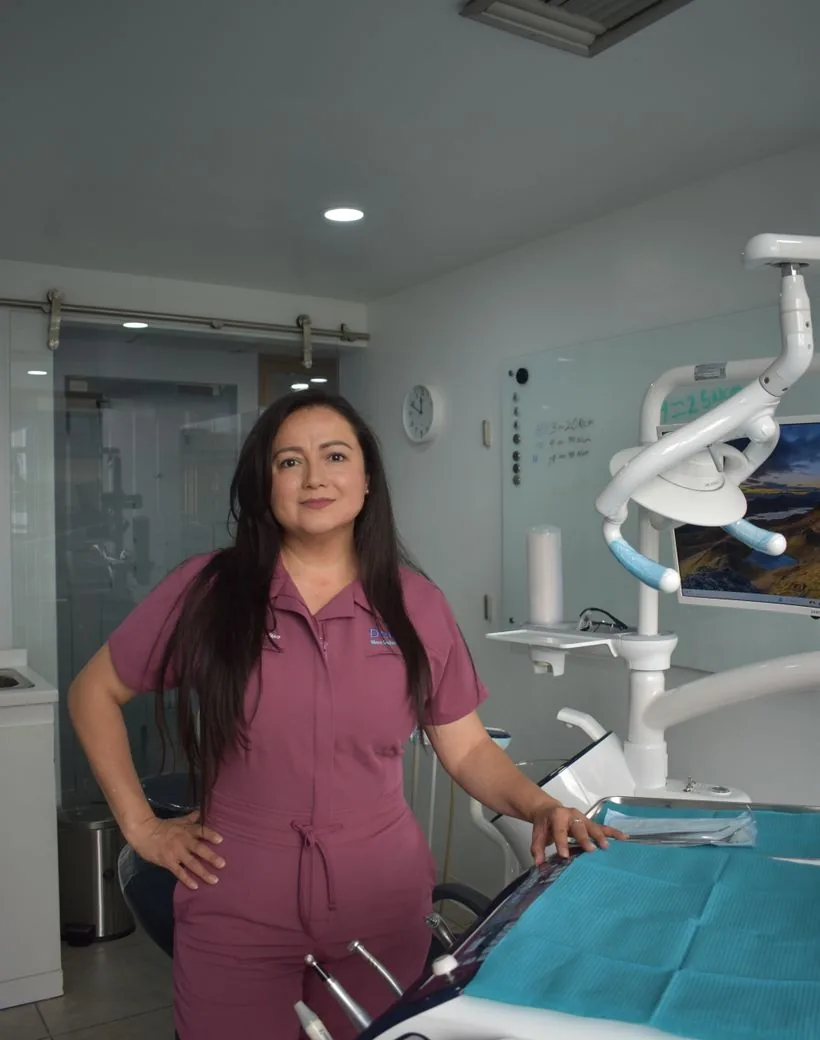 A friendly Brightwater team member in the bright, calm treatment room