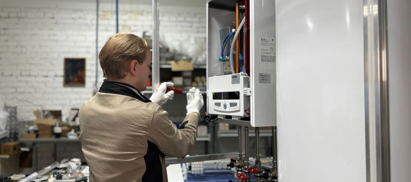 Meridian Climate — technician servicing a high-efficiency climate system