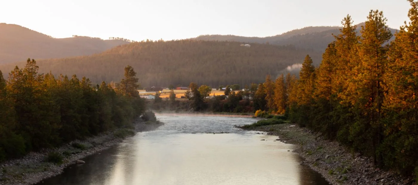Rivermark Community Foundation — a river winding through the valley our community calls home at first light