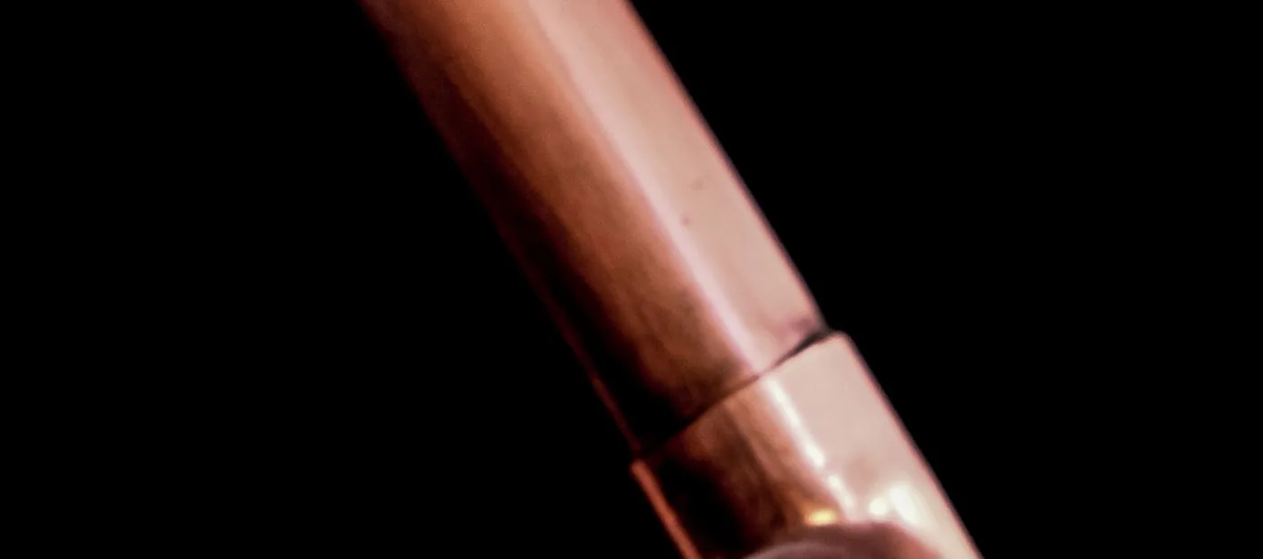 Copperline Plumbing — polished copper pipework, finished with craft