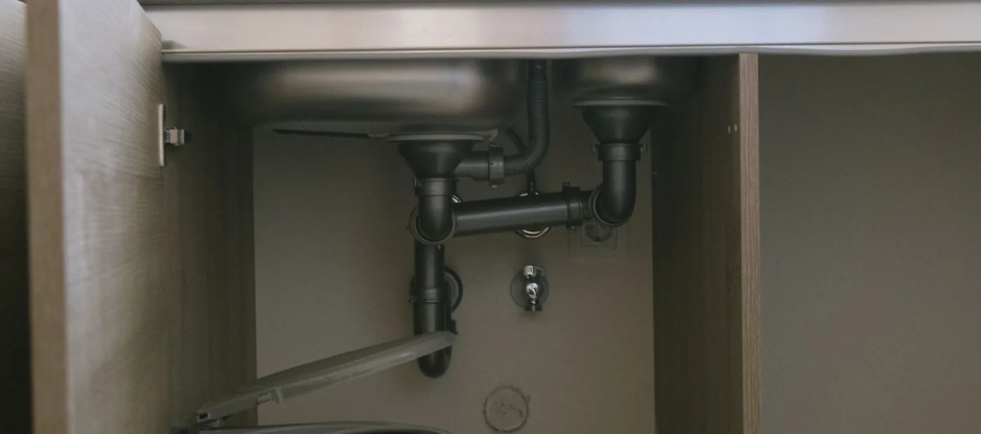 RapidFlow Plumbing — a clean under-sink drain and trap repair