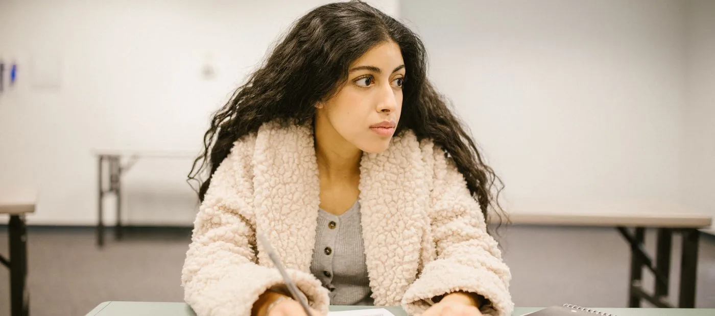 Summit Scores — a student focused at the desk during a timed practice test